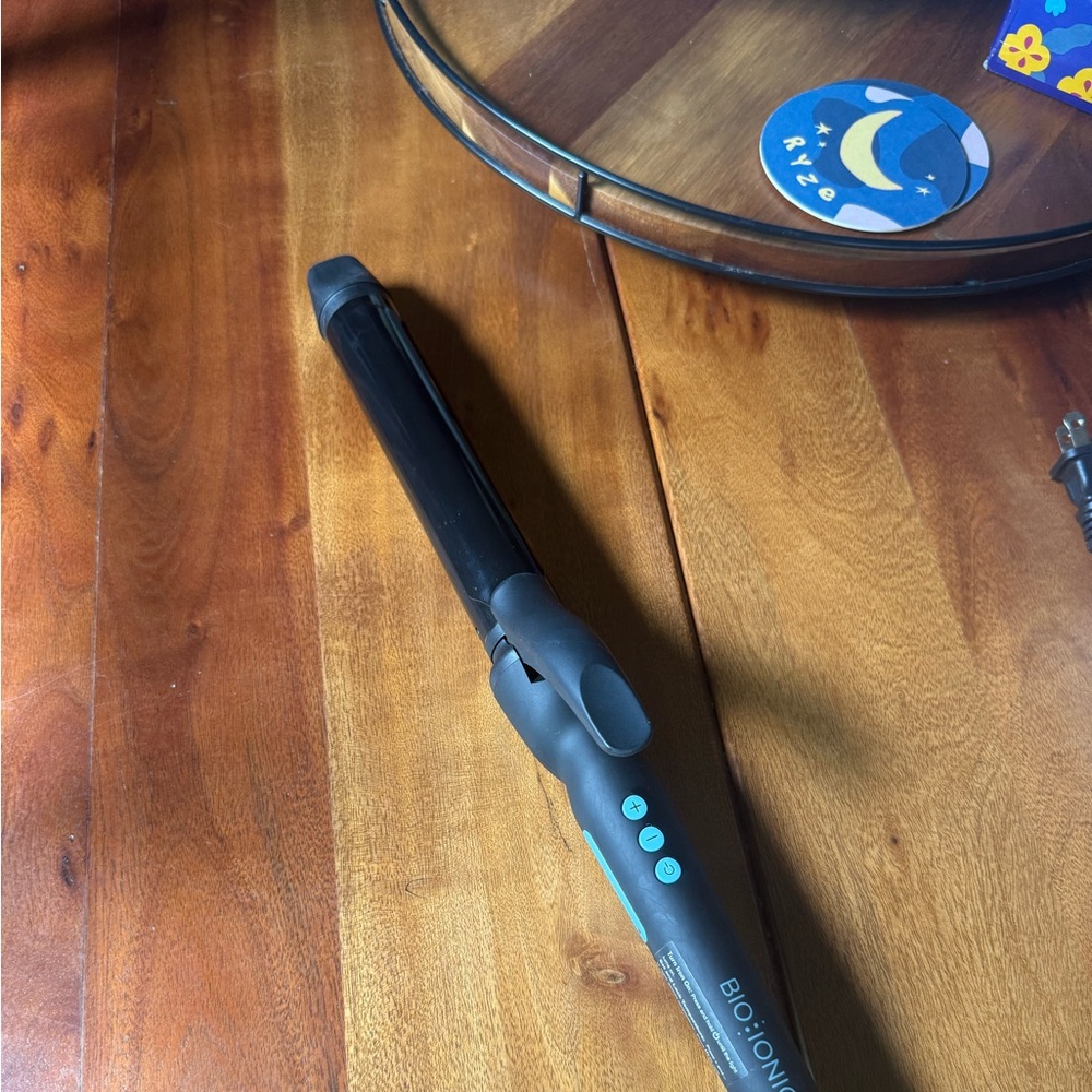 Long barrel 1.25 inch Bio Ionic Black Curling Iron. $109 on Amazon Prime Day